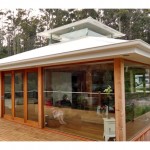 Wrap-around deck and floor to ceiling glass