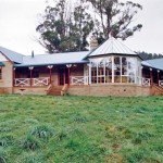 Mud brick rural home with conservatory.